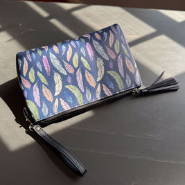 the featherlight clutch collection in vegan leather