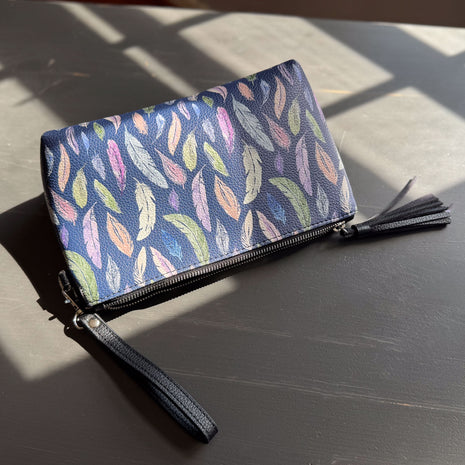 the featherlight clutch collection in vegan leather
