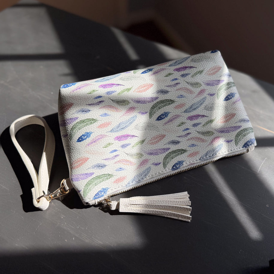 the featherlight clutch collection in vegan leather