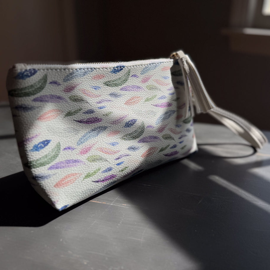 the featherlight clutch collection in vegan leather