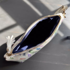 the featherlight clutch collection in vegan leather