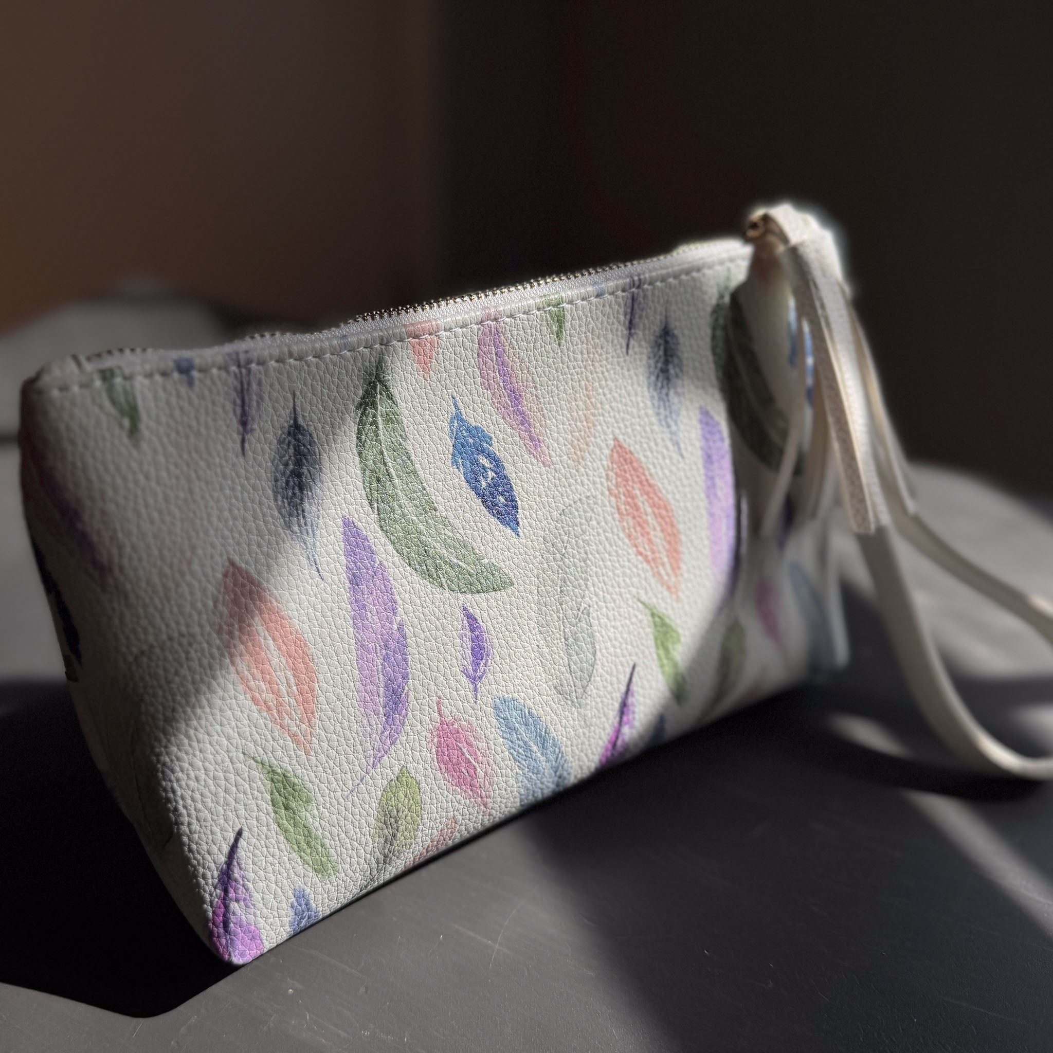 the featherlight clutch collection in vegan leather