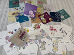 Collection of floral calendars cards on a textured surface