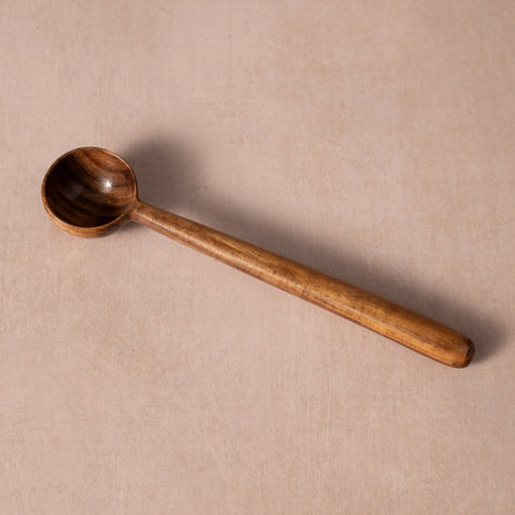 hand-carved wooden coffee scoop