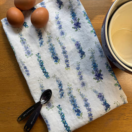 dancing delphinium linen tea towel